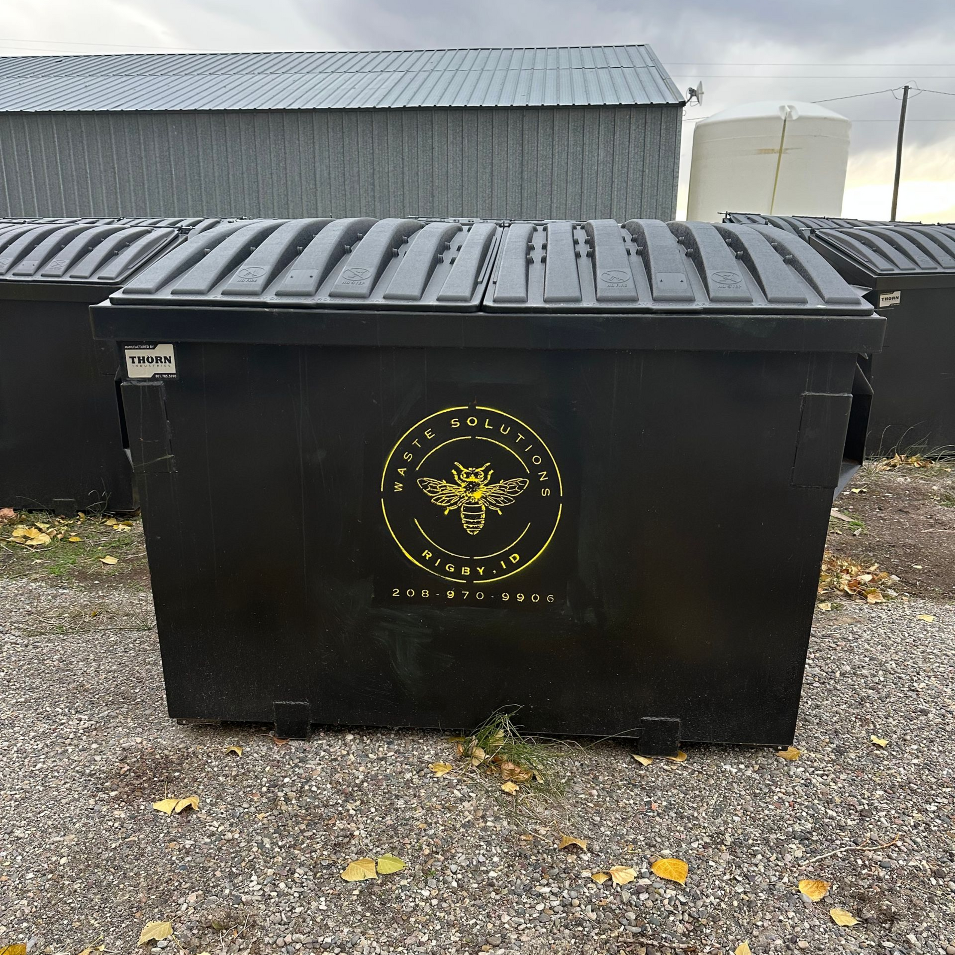 Black dumpster with 