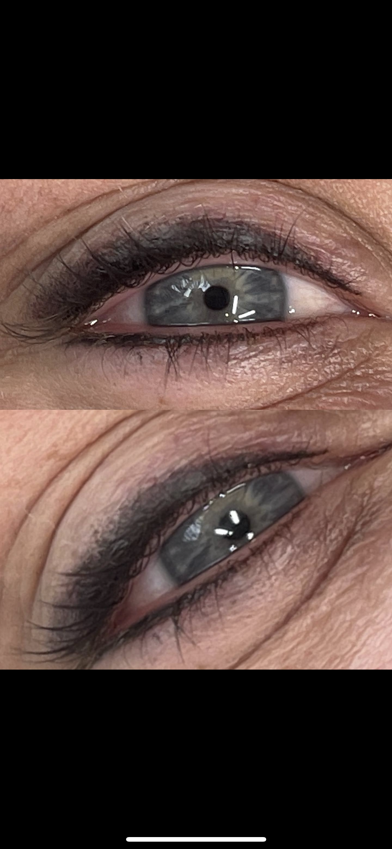 A close up of a woman 's eyes with makeup on.