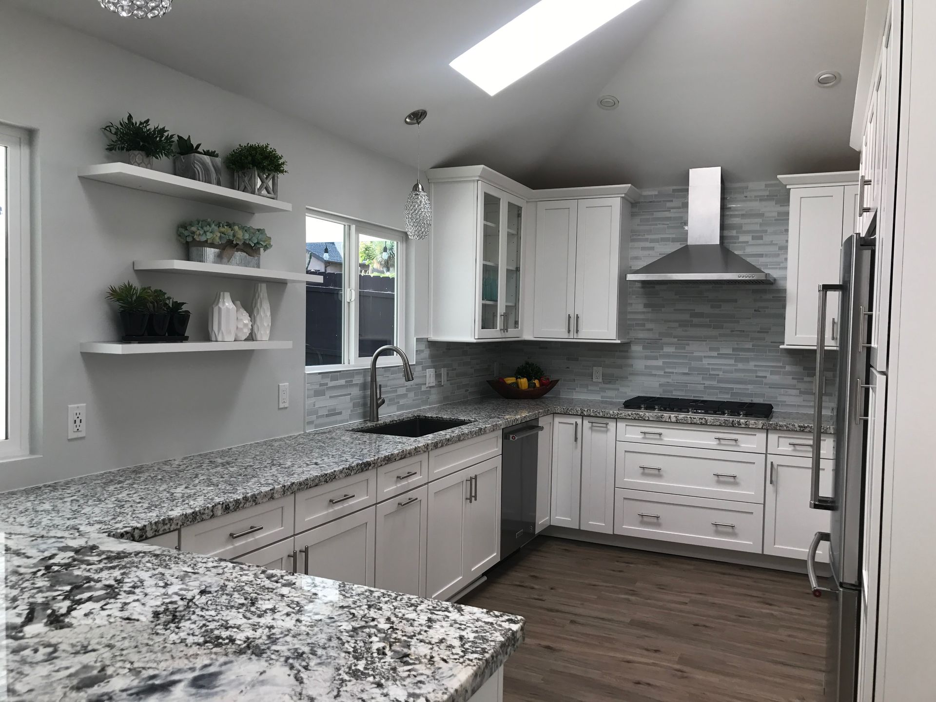 Remodeled Kitchen, New Cabinets and Countertops and skip troweled textured walls in Carlsbad CA.