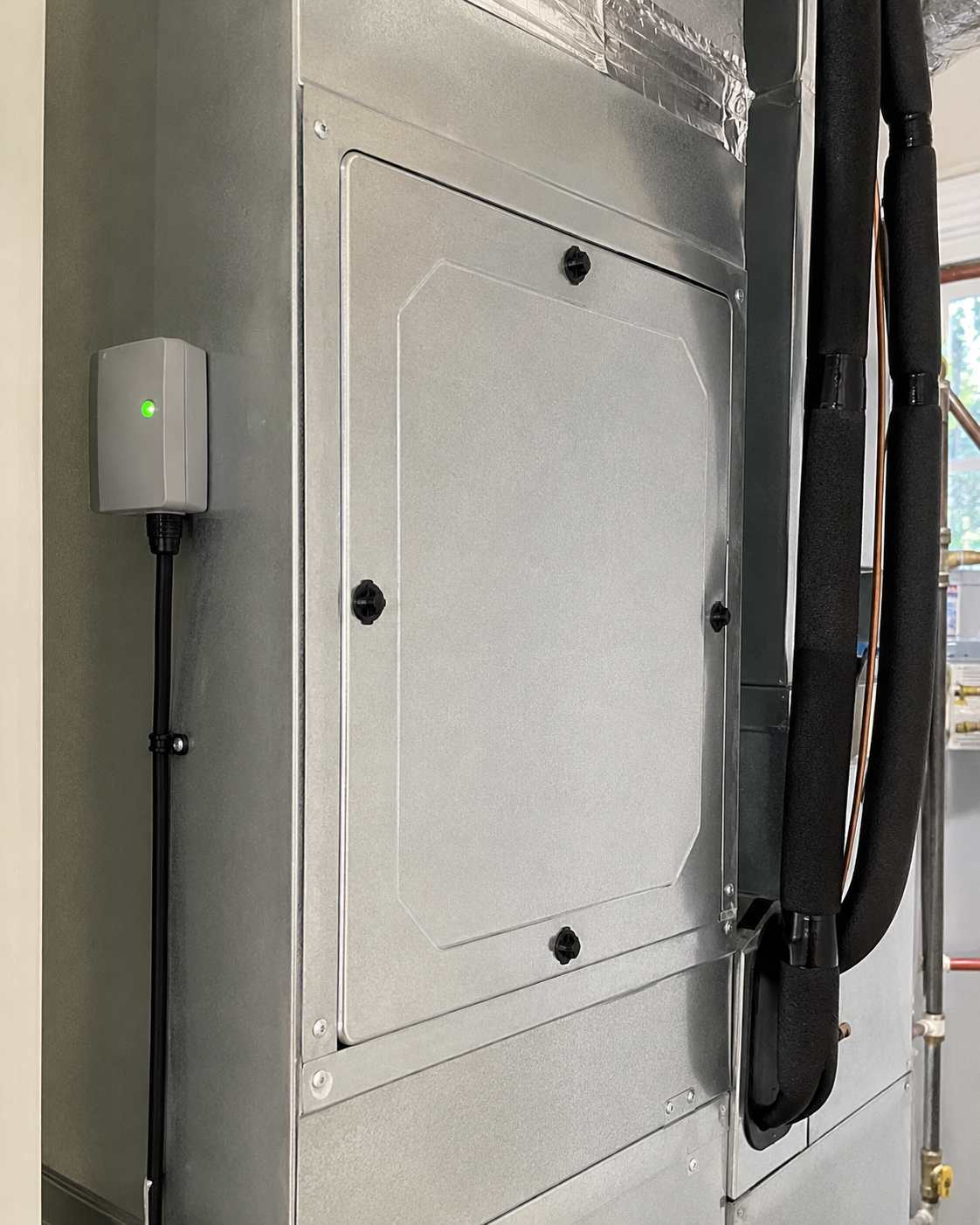 Digital wall thermostat displaying indoor heating control settings.