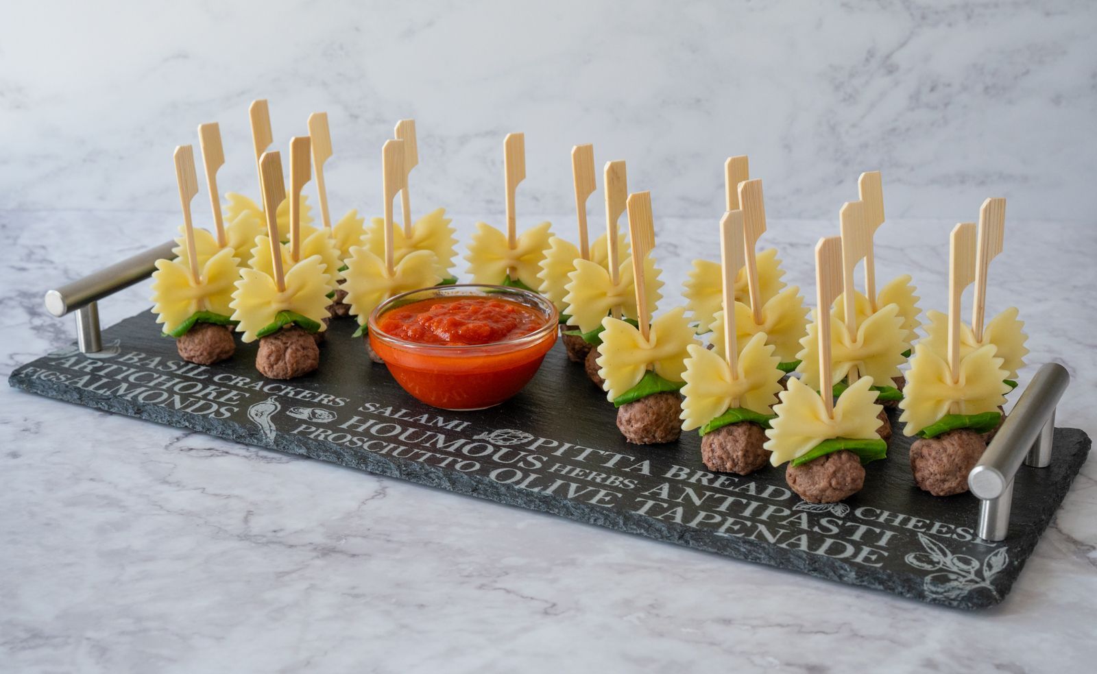 Meatballs and pasta with tomato dip