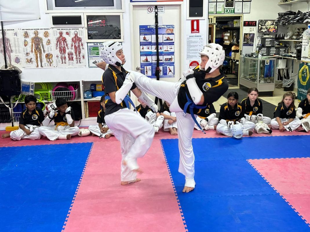 Two Kids Having a Sparring Match of Taekwondo — Him-Do Tae Kwon Do Academy In Salamander Bay, NSW