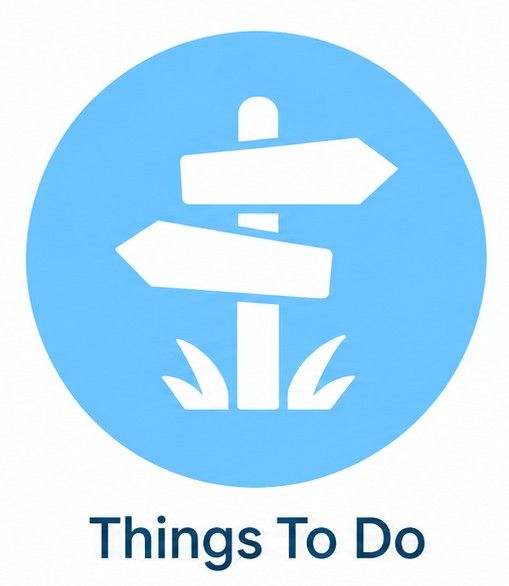 Blue circular sign with white direction arrows and the text “Things To Do” below