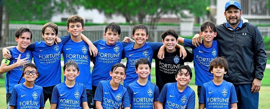 Miami Breakers FC 2012 White celebrating Champions of the 2023 United Soccer Cup & Showcase
