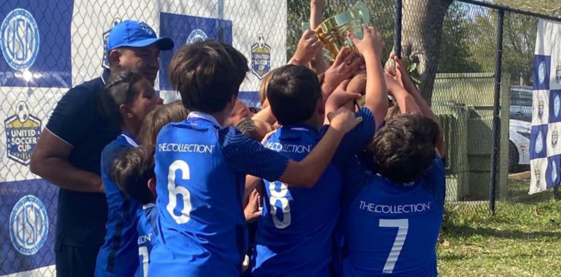 Miami Breakers FC 2012 White celebrating Champions of the 2023 United Soccer Cup & Showcase