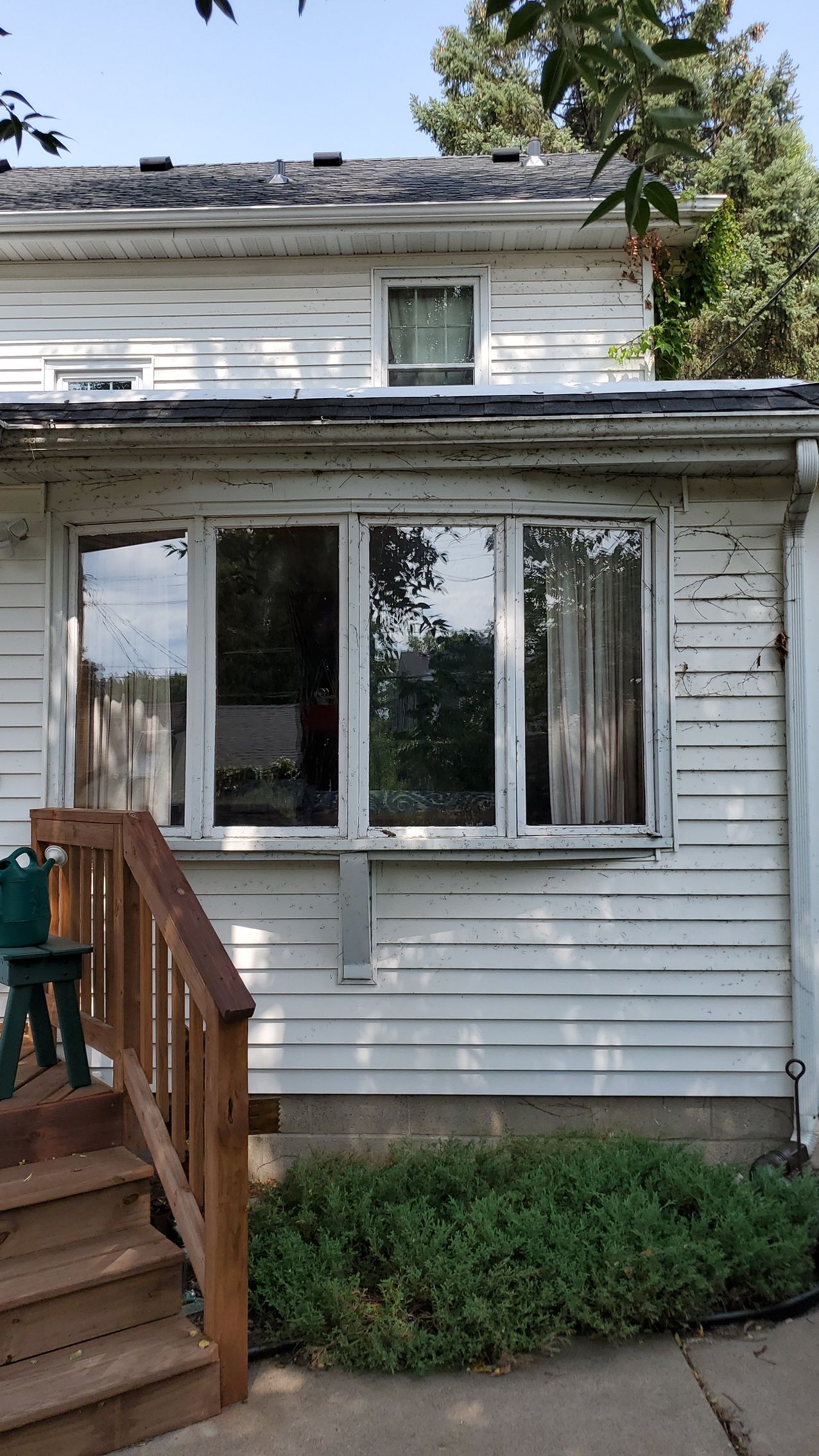 Windows Before — Carver, MN — TJ Exteriors Inc.