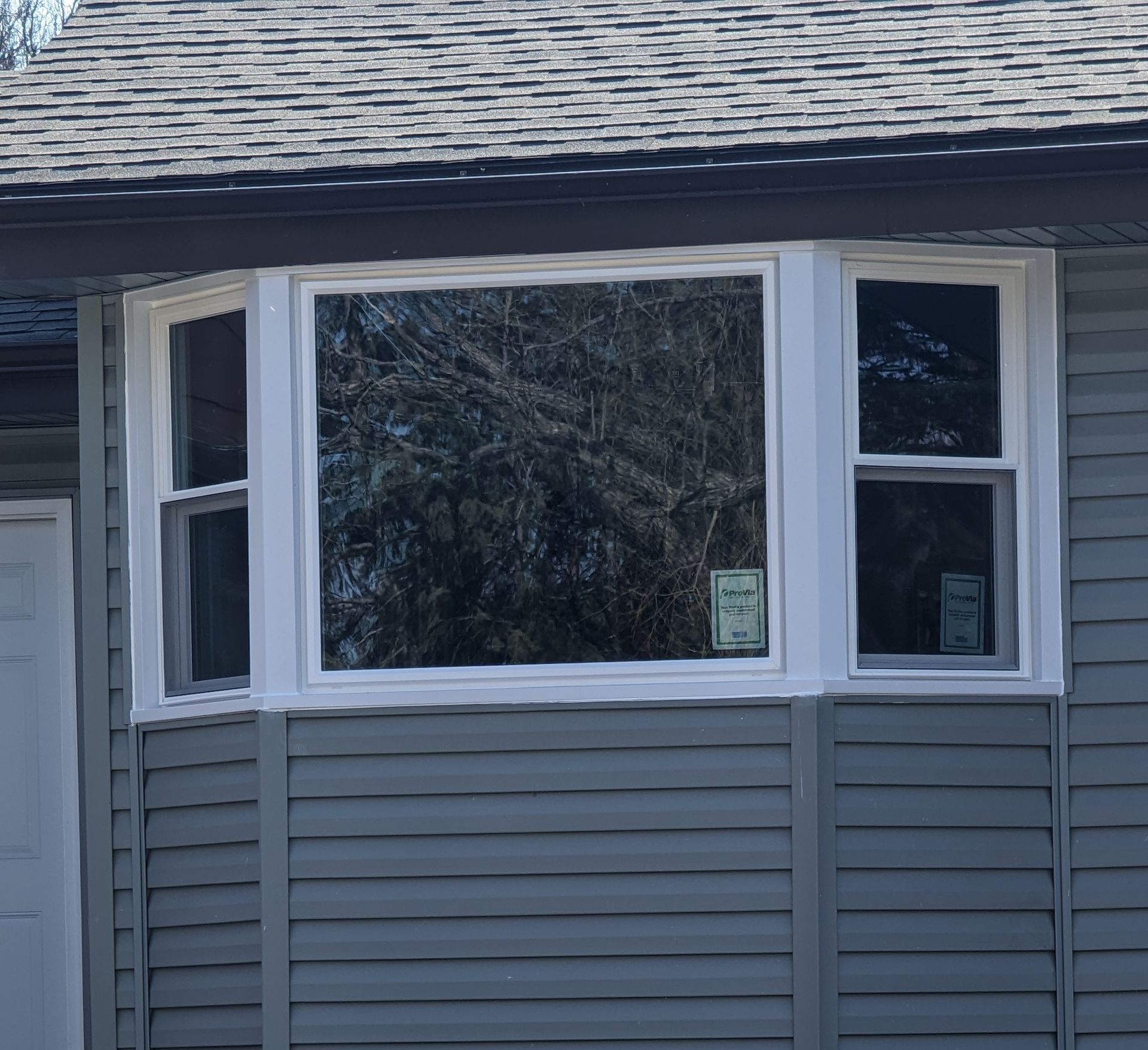 Modern House With Close Window — Carver, MN — TJ Exteriors Inc.