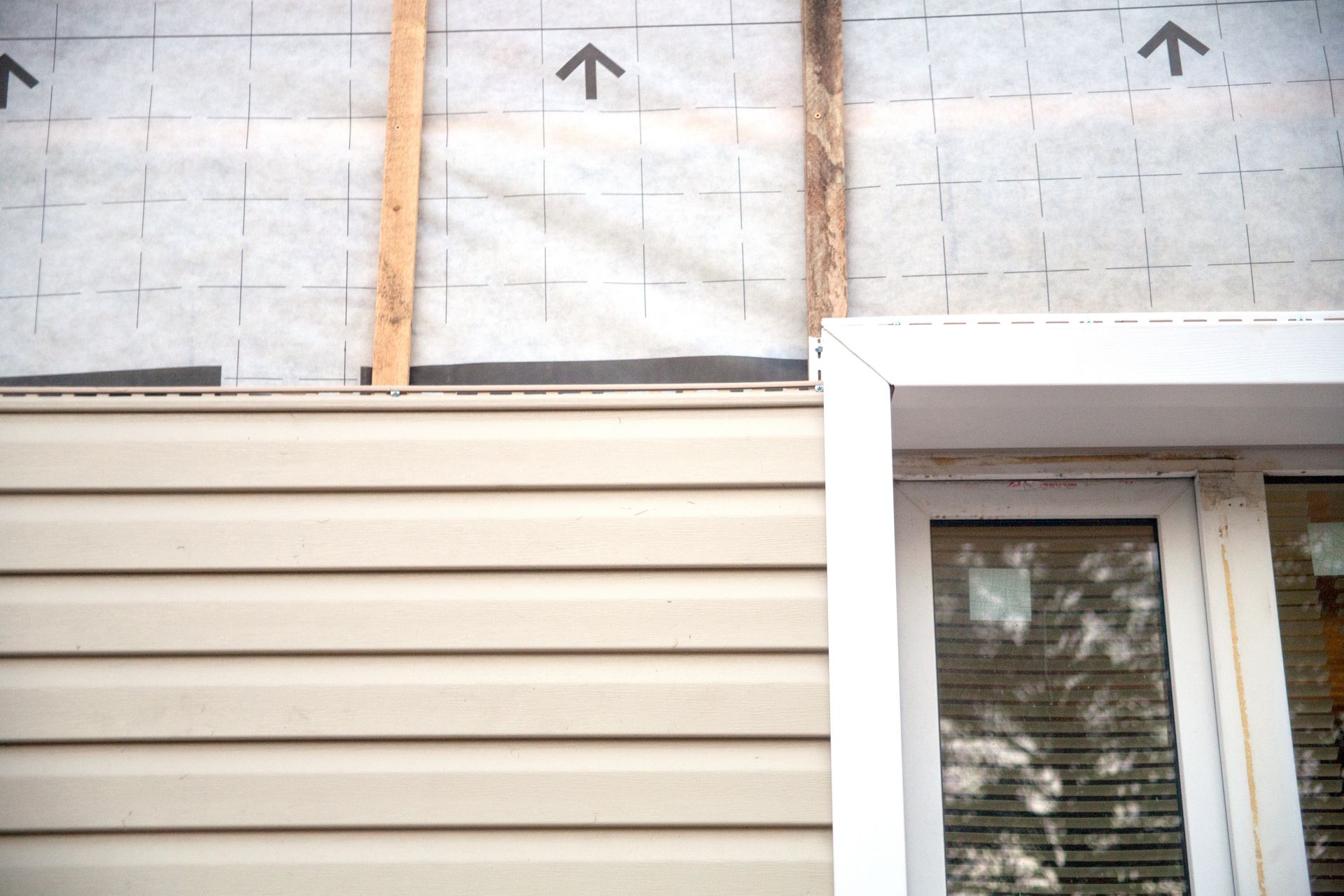 Siding installation in progress Siding installation in progress