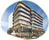 Modern multi-story building with glass and curved architectural features; sunny day.