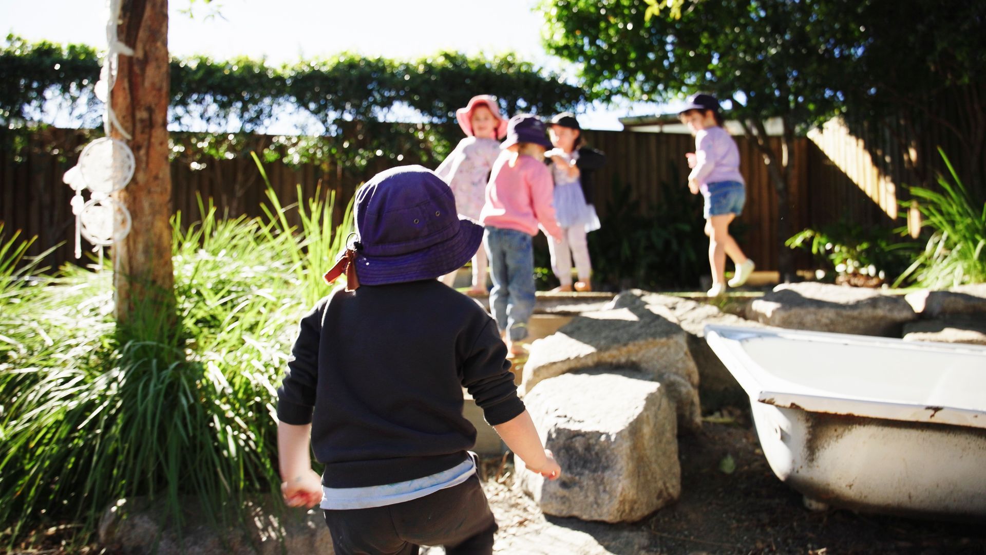 child walking up sandstone