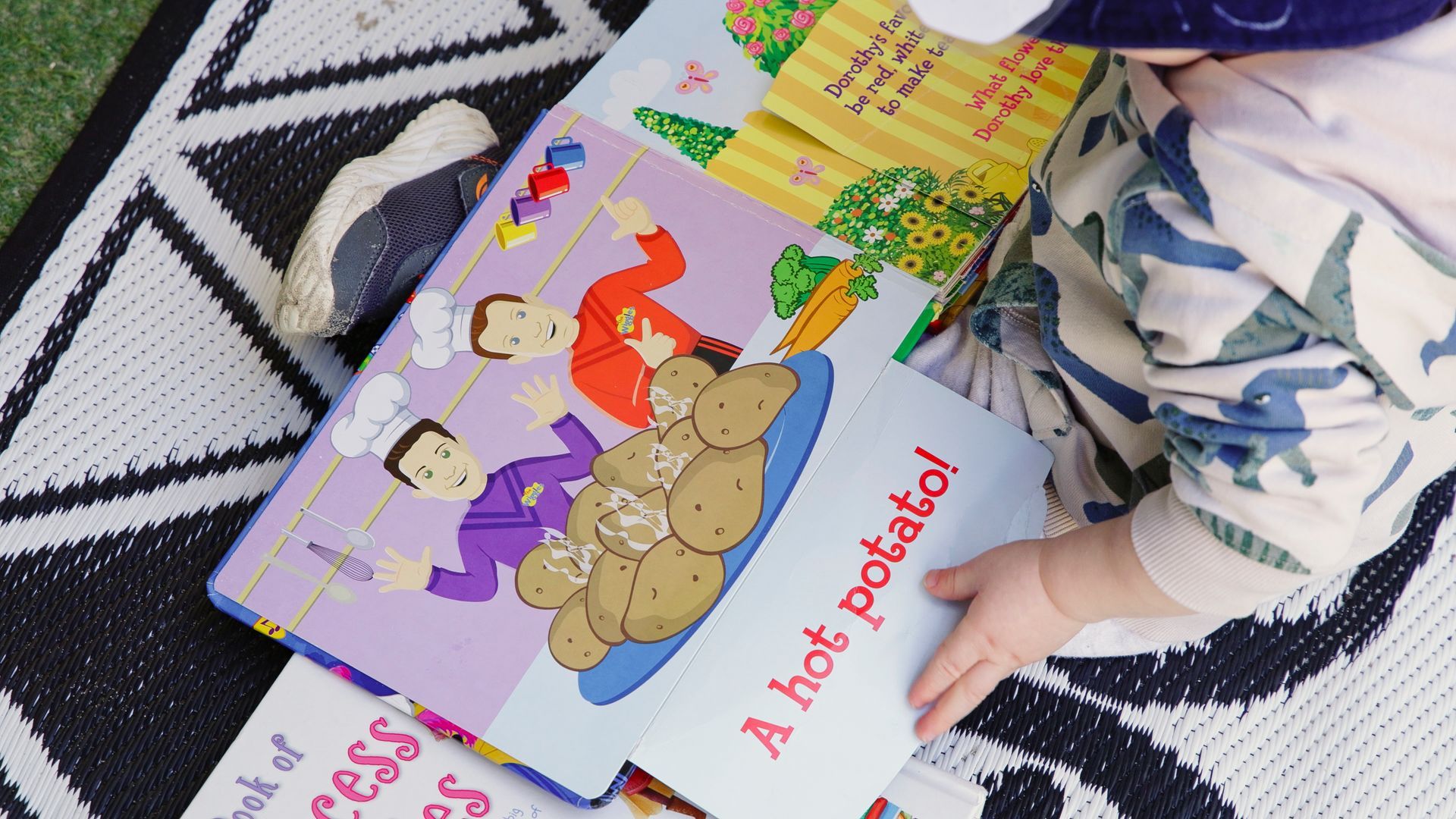 Book open to a hot potato by the Wiggles