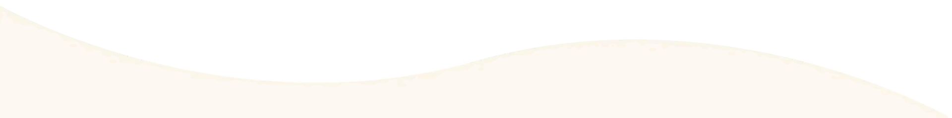 Blurred beige and white surface.
