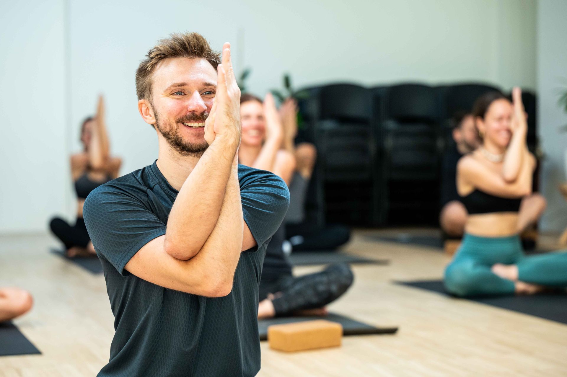 smiling man at yoga space Brussels