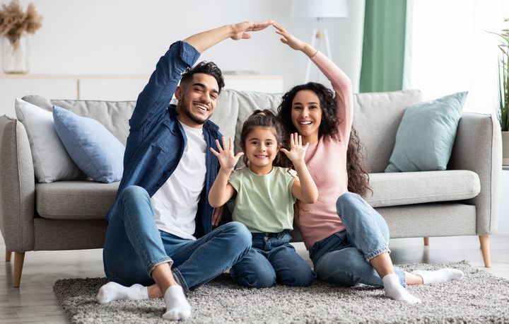Happy Family in the Living Room