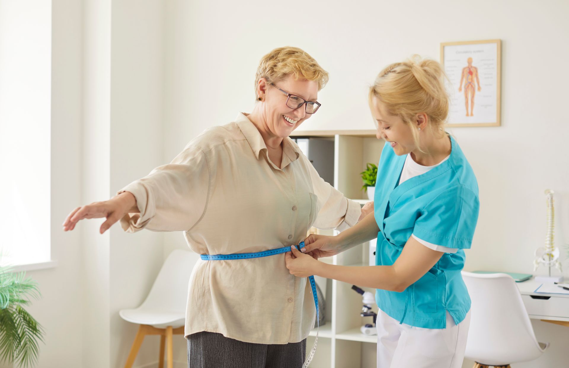 Doctor reviewing GLP-1 medication options for weight loss programs with a patient Doctor reviewing GLP-1 medication options for weight loss programs with a patient