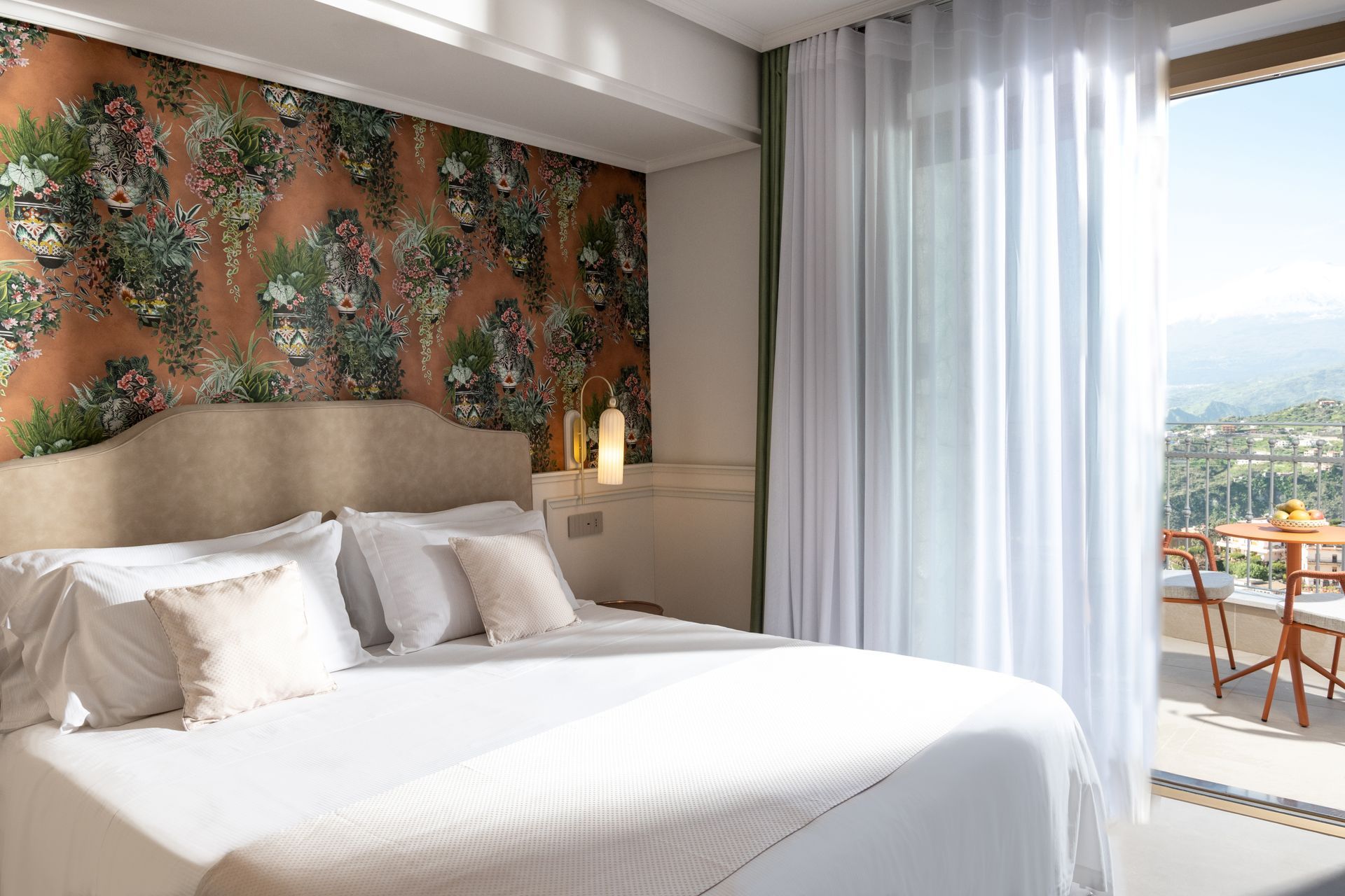 An artist 's impression of a hotel room with a large bed and a balcony.
