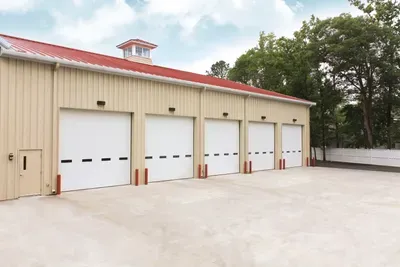 White Commercial Garage Doors — Beatrice, NE — Blue Valley Door Co. Inc. White Commercial Garage Doors — Beatrice, NE — Blue Valley Door Co. Inc.