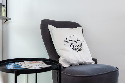Couchsessel mit Kissen