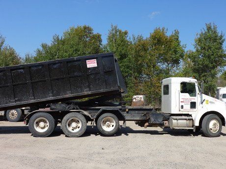 Disposal Truck with Black Container — Deer River, MN — American Disposal Disposal Truck with Black Container — Deer River, MN — American Disposal