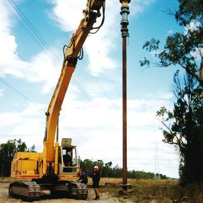 Transmission line screw pile foundations