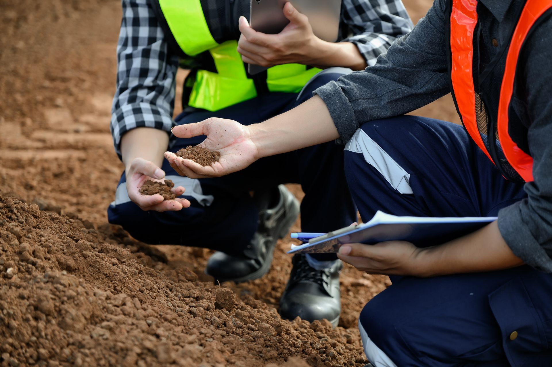 Engineers are inspecting soil for construction improvement-based work.