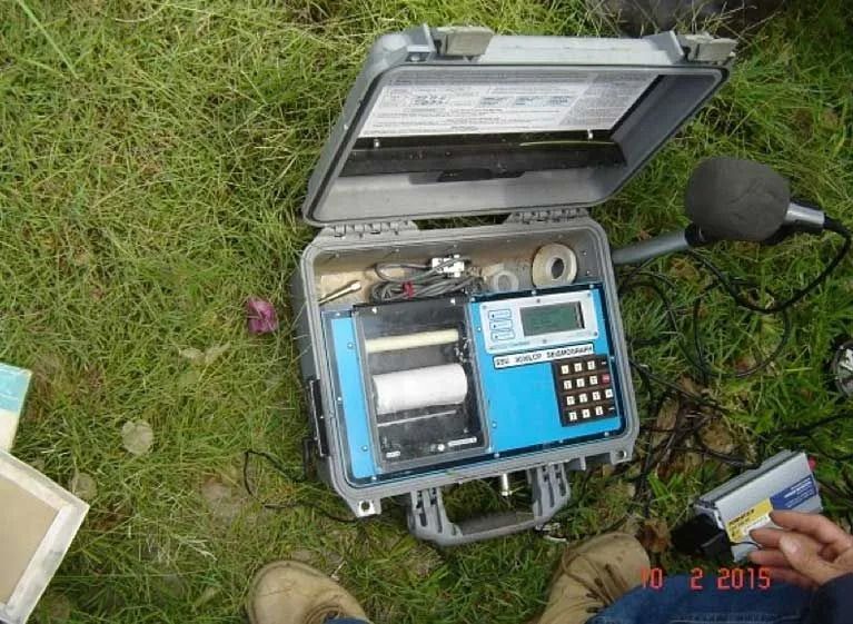 Field instruments positioned on site to record vibration levels as part of geotechnical soil testing.