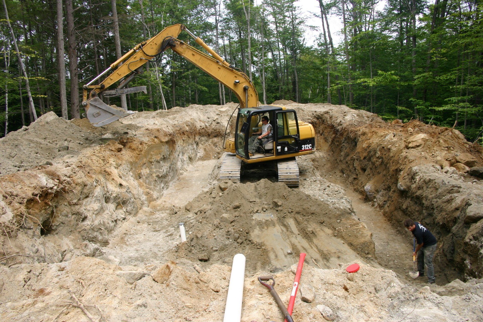 Excavator excavating.