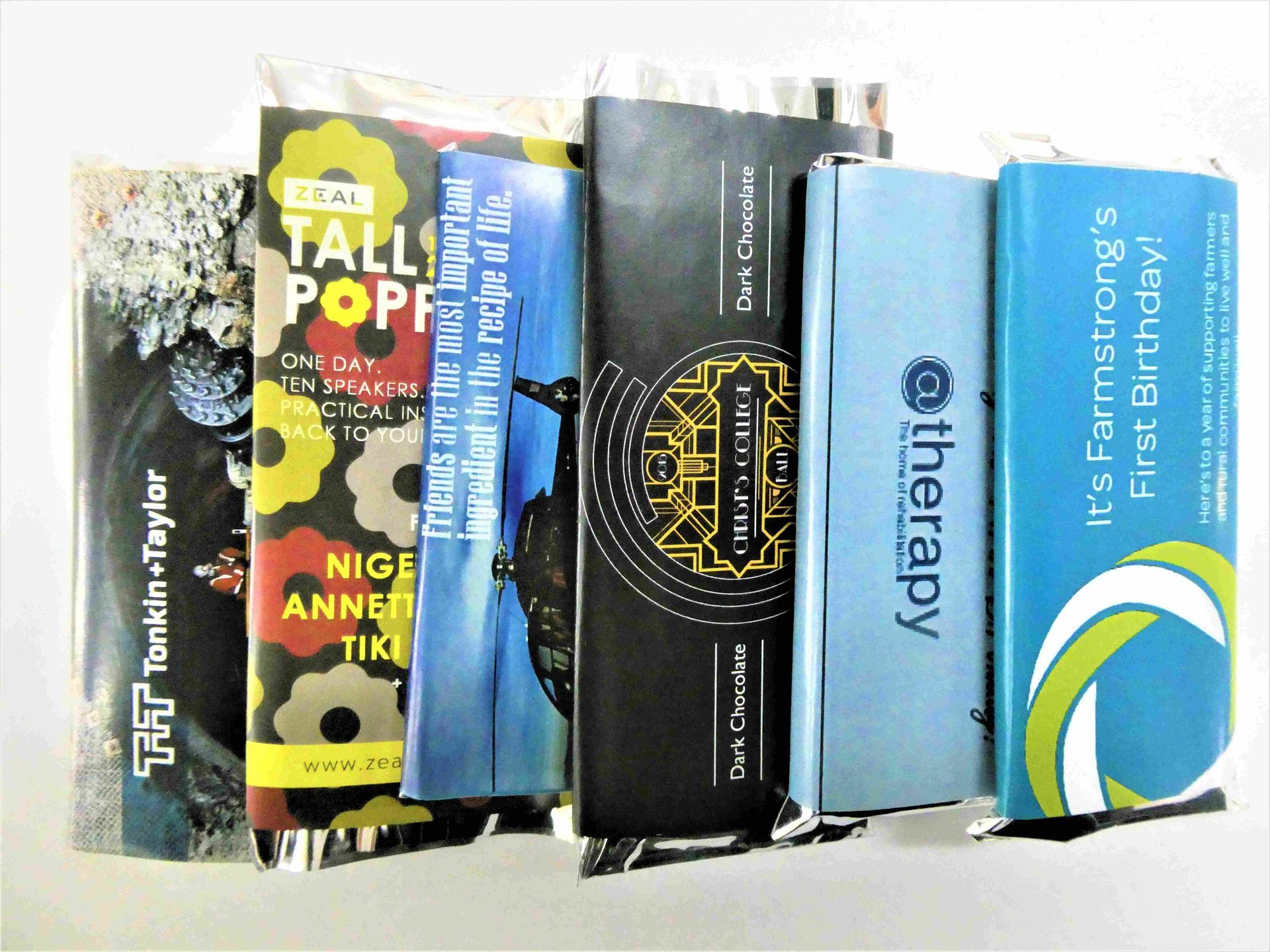 Blocks of chocolate with custom wrapping of customer logos