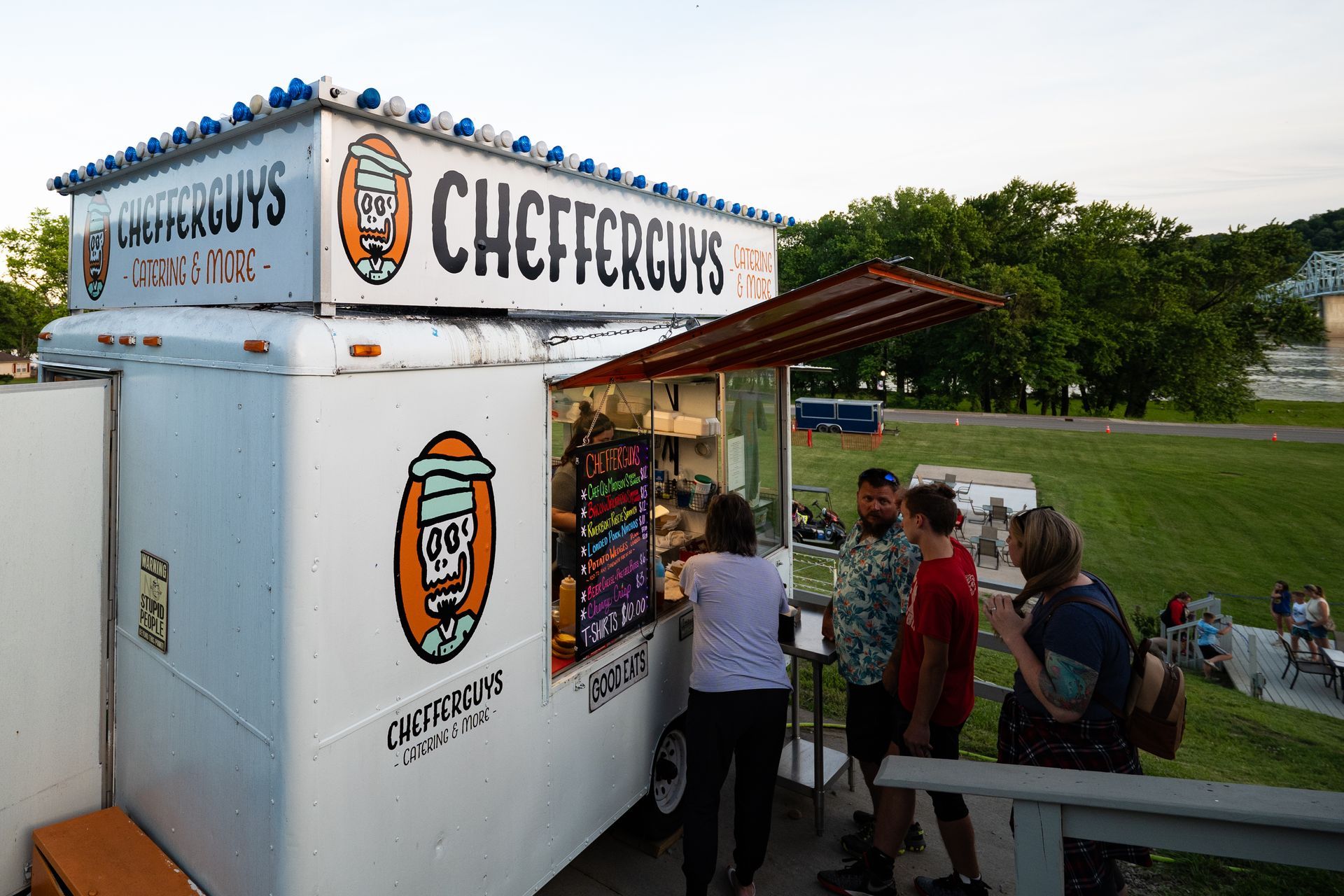 White food truck labeled 