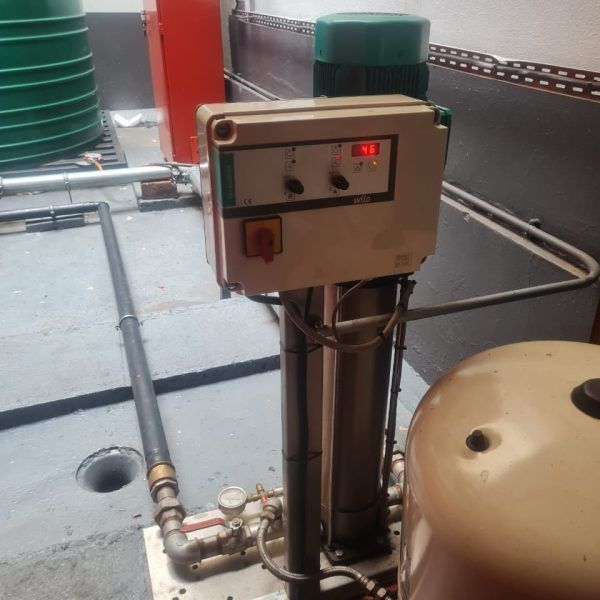 A machine with a box on top that says ' eh ' on it