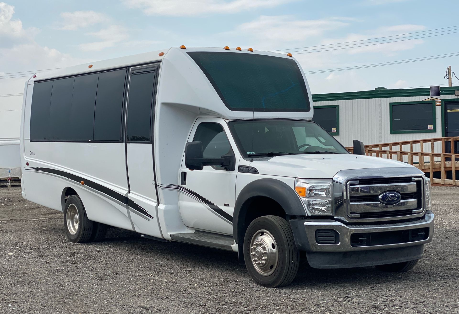 white Grech 20 passenger executive shuttle bus
