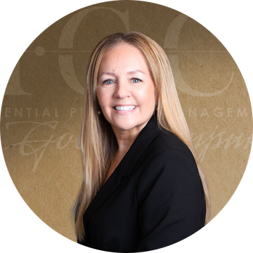 Woman with long blonde hair, smiling, wearing a black blazer. Brown background with text.