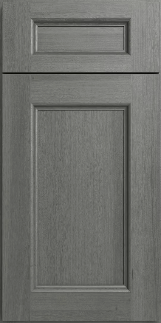 Gray cabinet door with a small top drawer and a recessed rectangular panel.