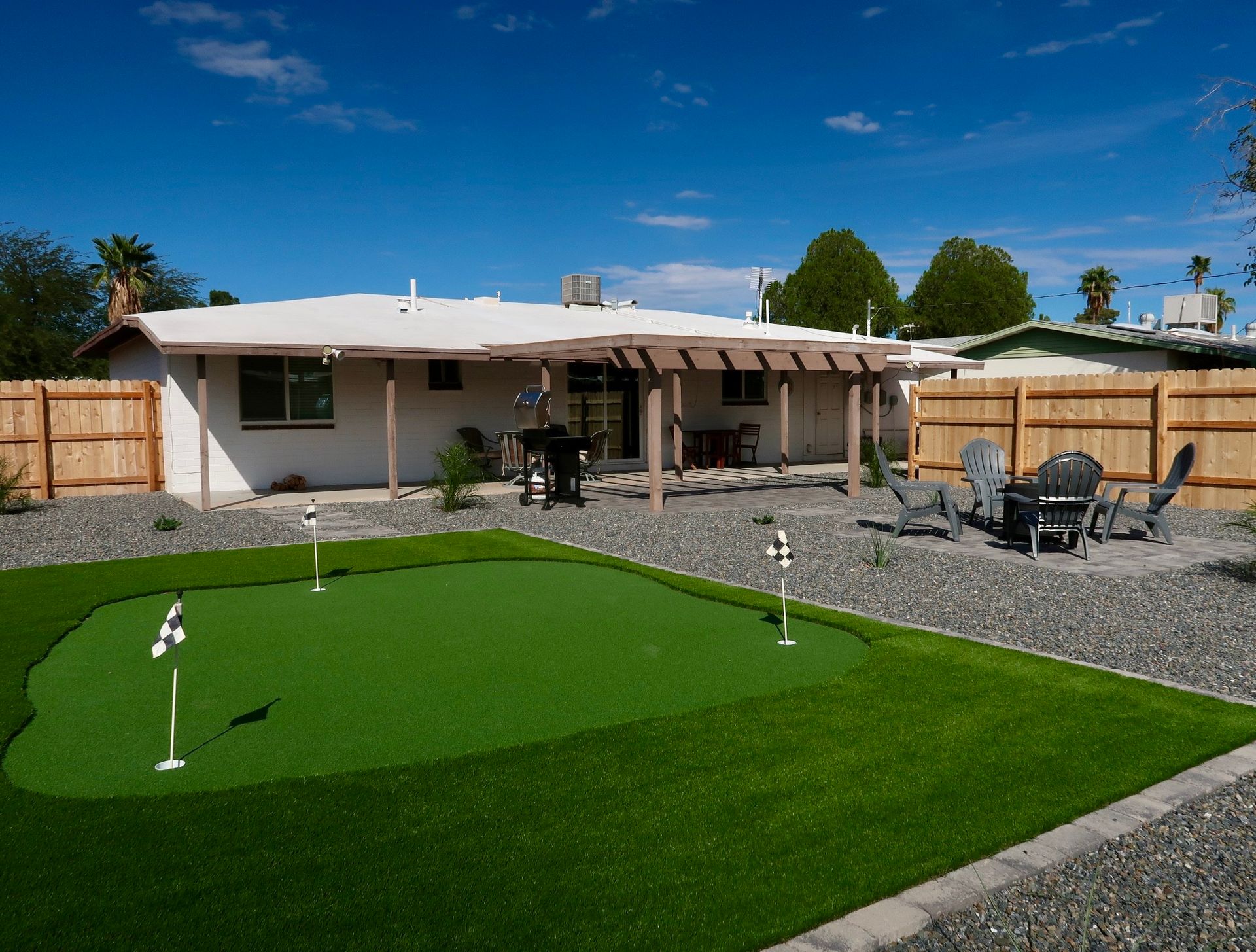 A mini golf course in the backyard.