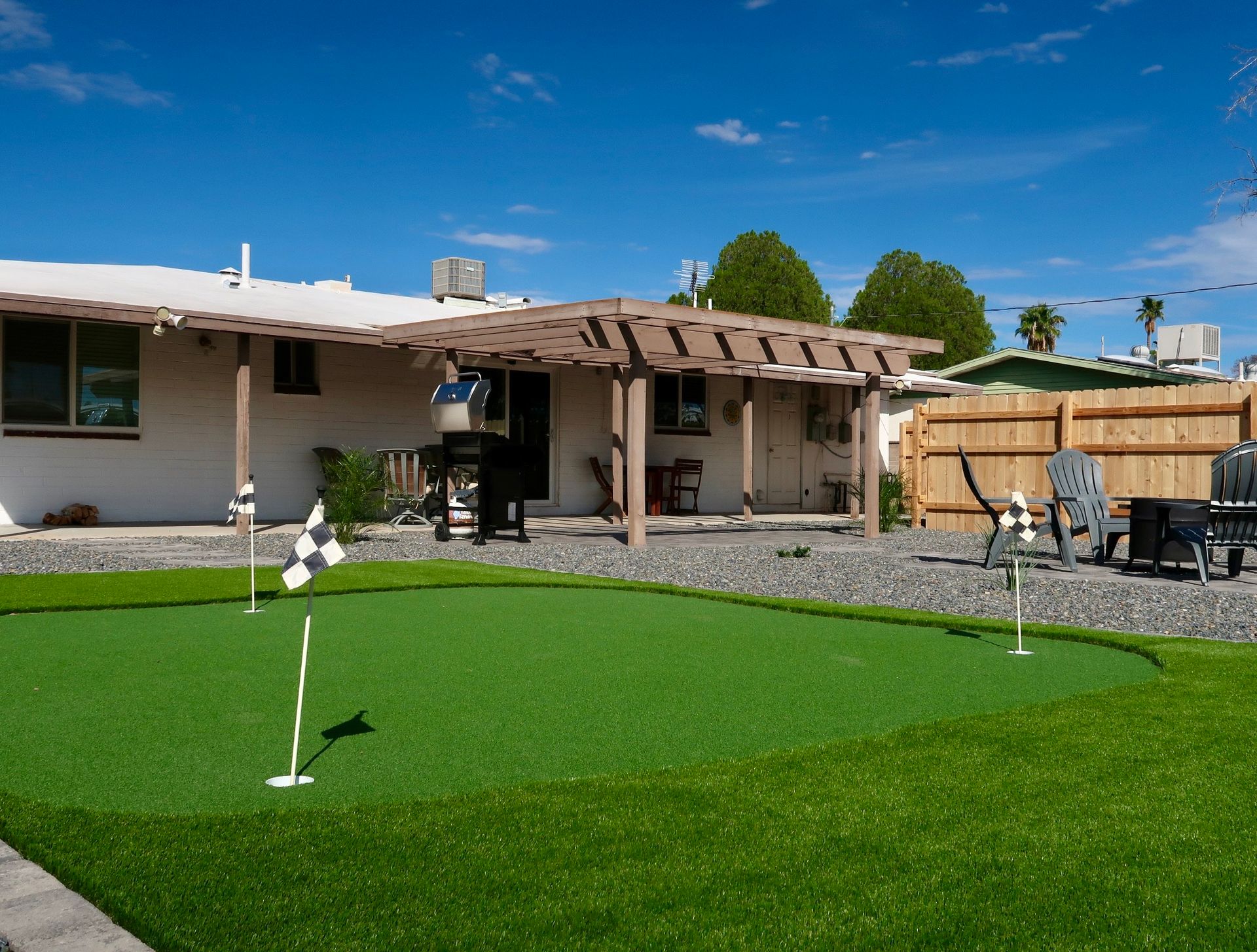 A mini golf course in the backyard.