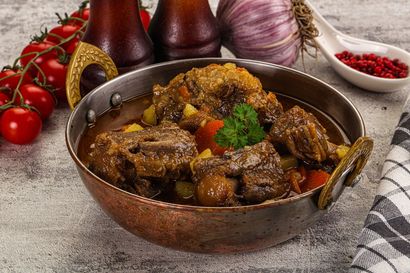 Jerk chicken thighs with rice and peas