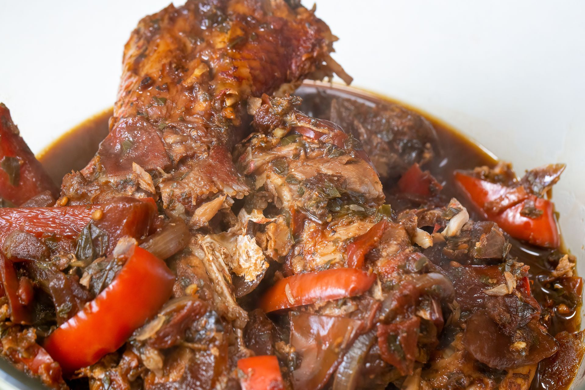 Fish braised in dark-brown island gravy