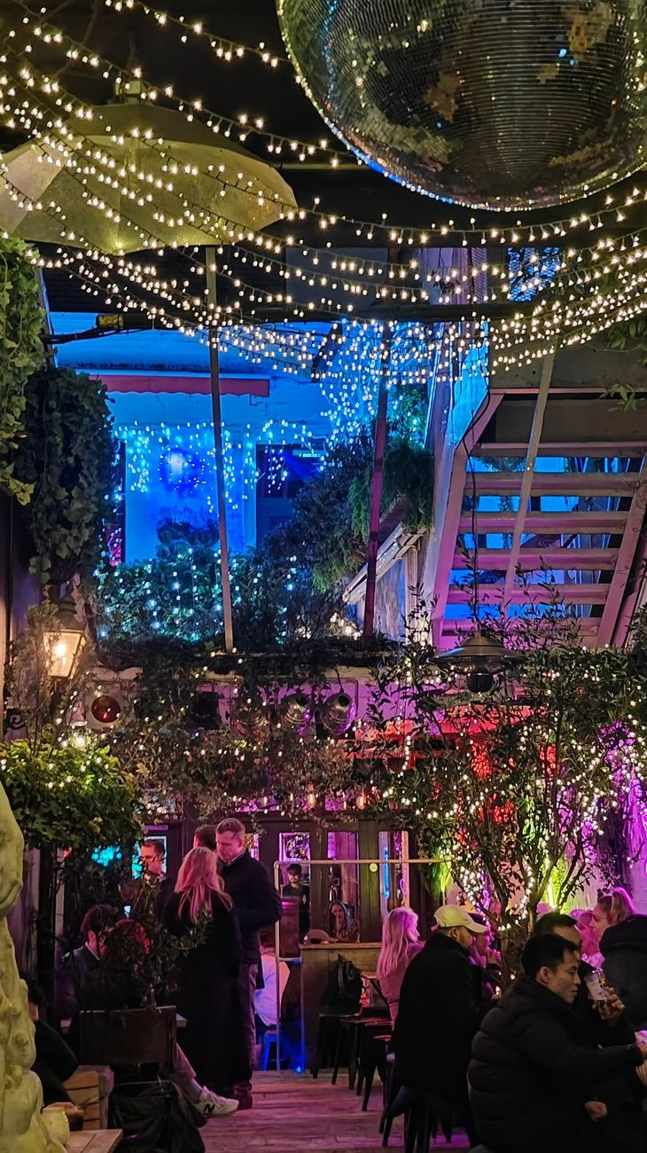 Walking through our fairy-lit tunnel towards the Courtyard and Stable Bar