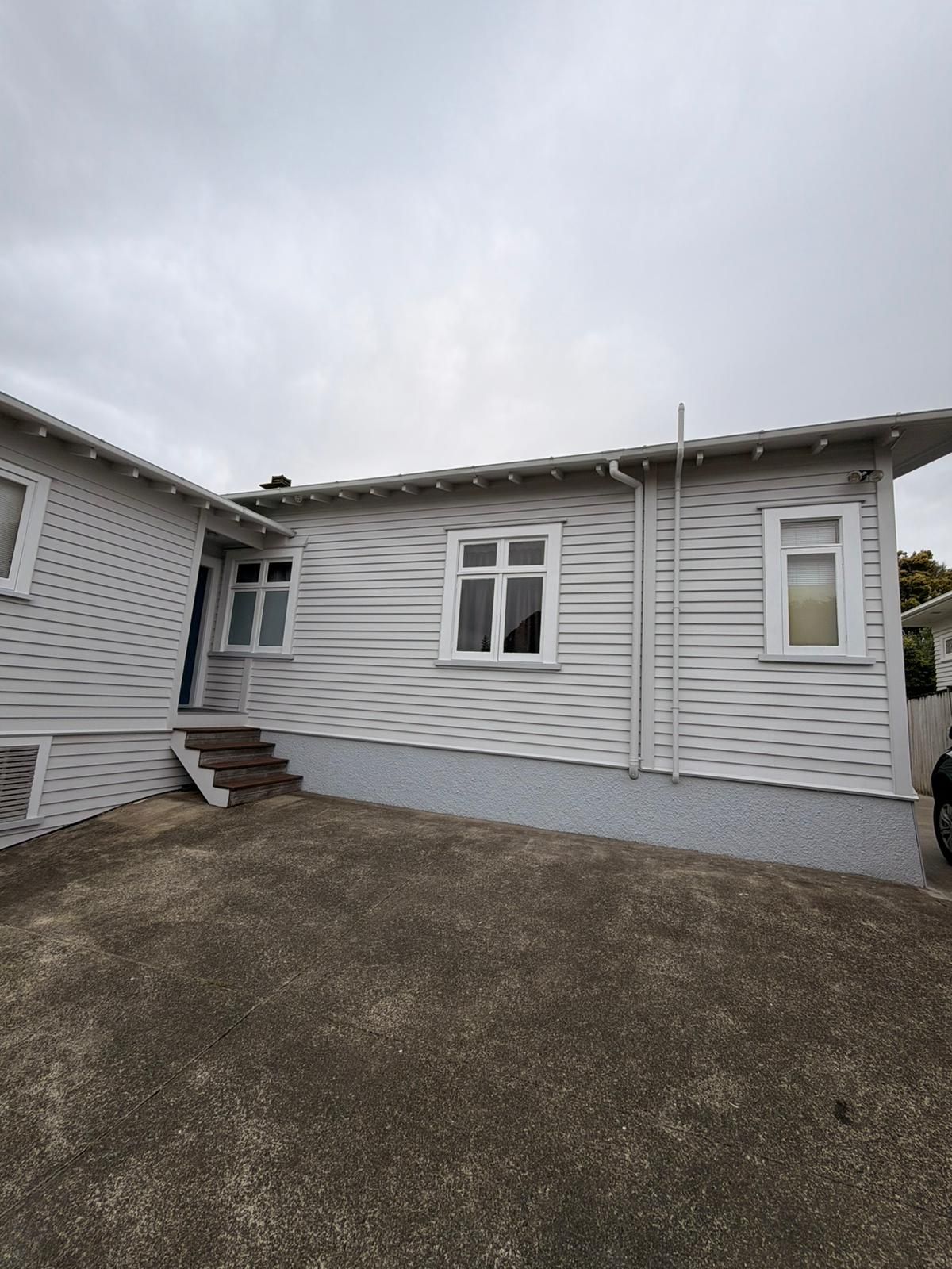 House exterior painting with clean, professional finish