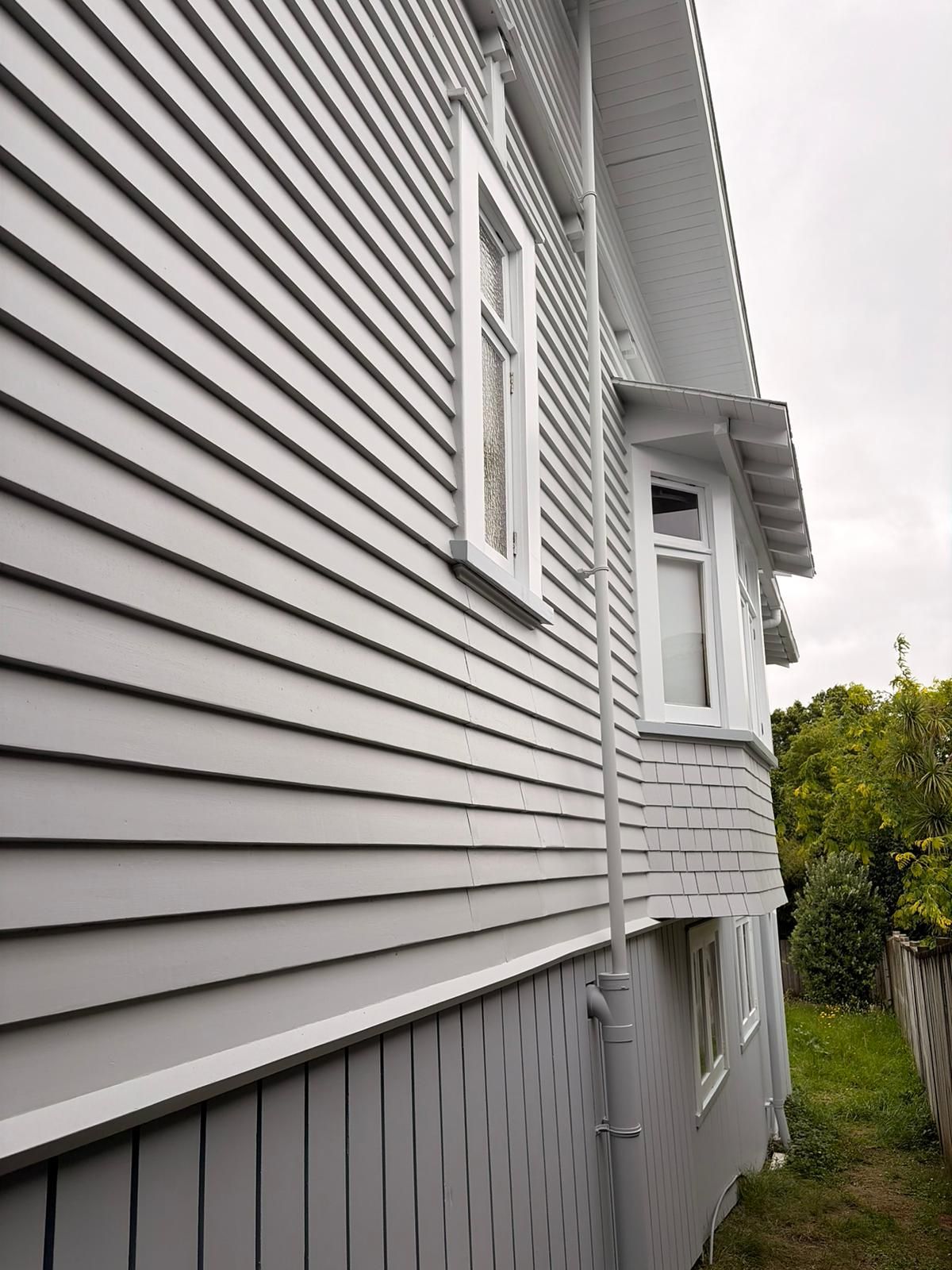 Painting of a two-story Auckland home exterior