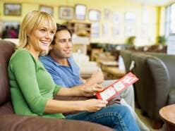 Couple sitting on the couch — College Station, TX — Quality Used Furniture
