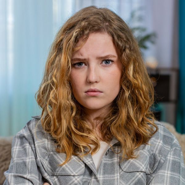 a young woman with Progesterone imbalance is feeling irritable