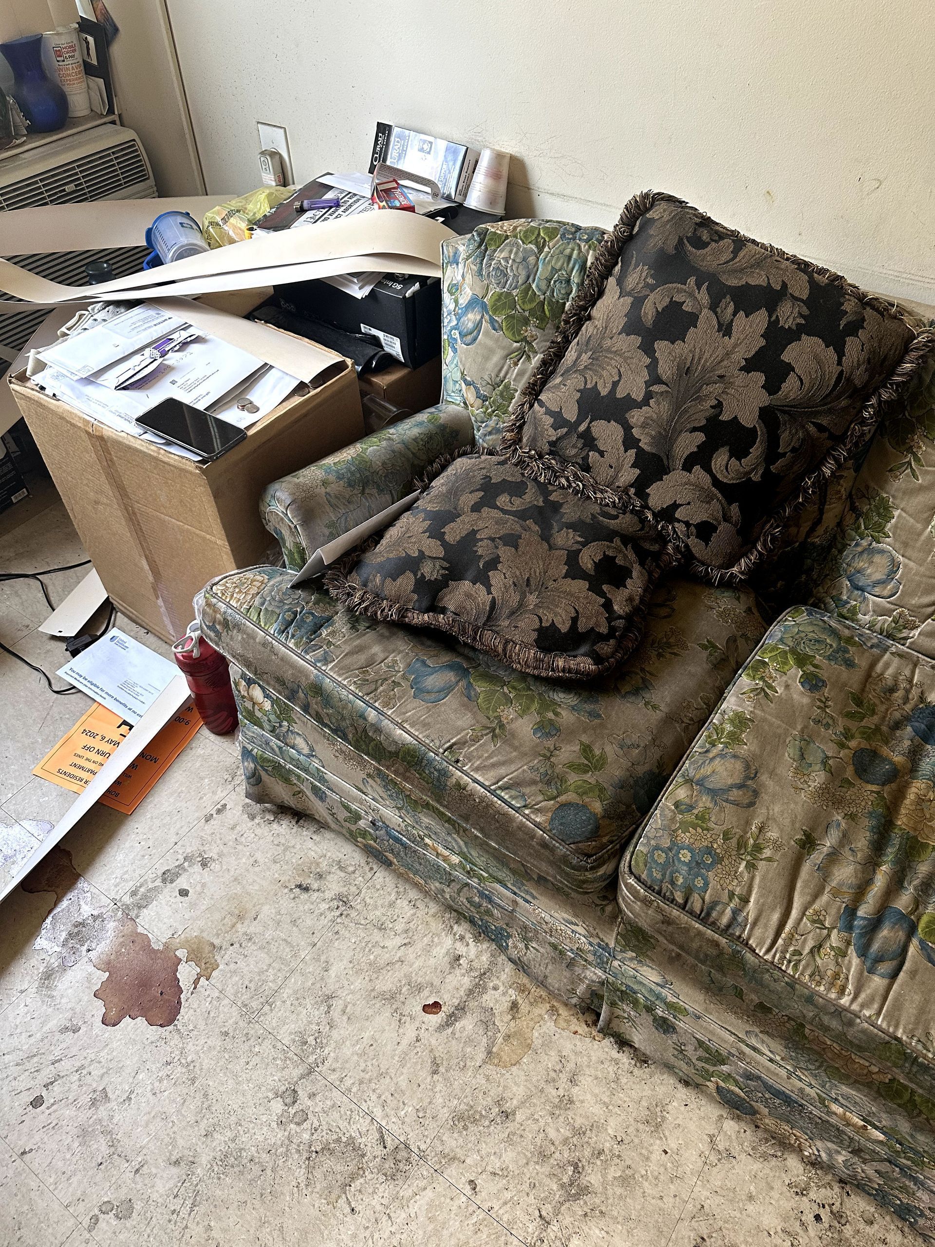 A before shot of a living room in a trauma cleanup in Ohio by Kingdom Bio Recovery & Restoration
