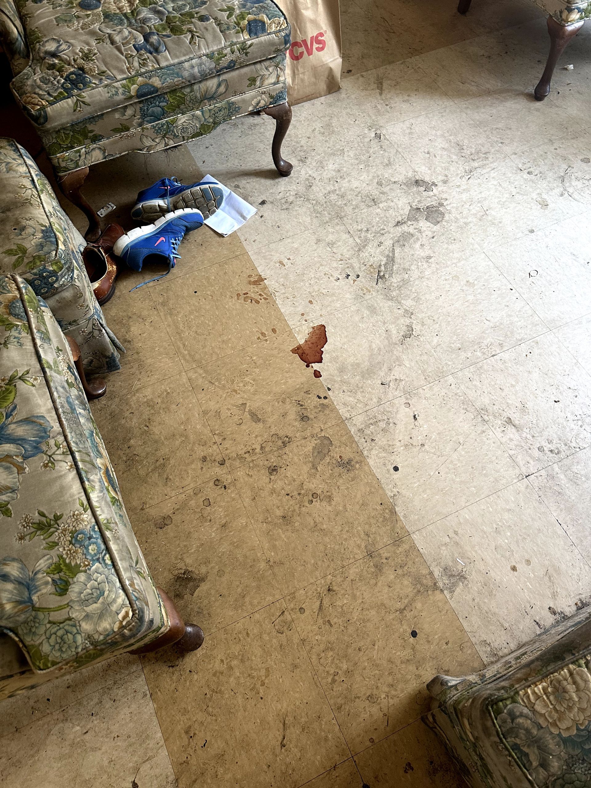A before shot of a living room in a trauma cleanup in Ohio by Kingdom Bio Recovery & Restoration