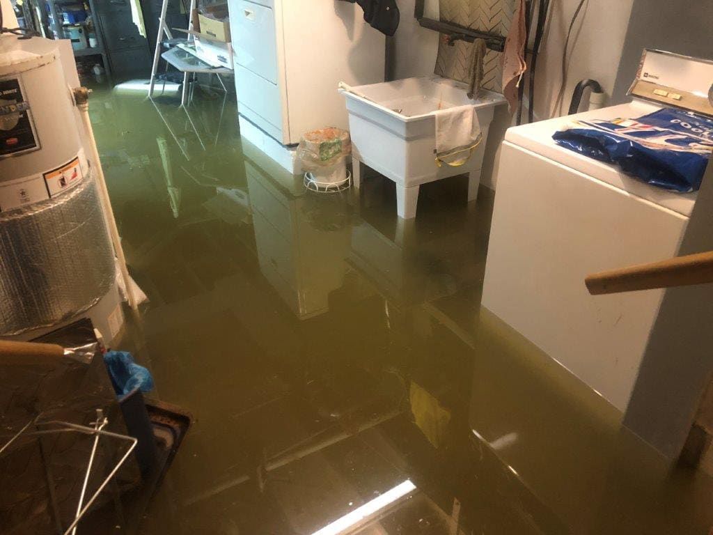 A before shot of a water restoration in Pittsburgh, PA by Kingdom Bio Recovery & Restoration