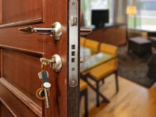 Image of lock and key on a door, photo for Advance Lock & Key, locksmith in Staten Island, NY.