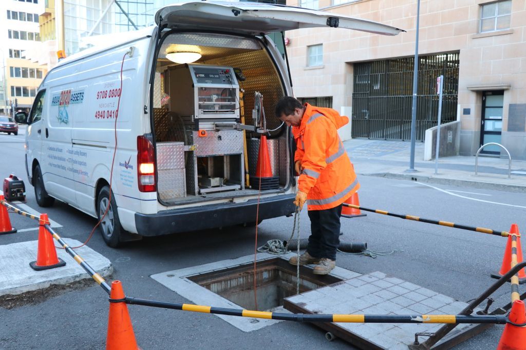 An Aqua Assets team member conducting a CCTV pipeline inspection.