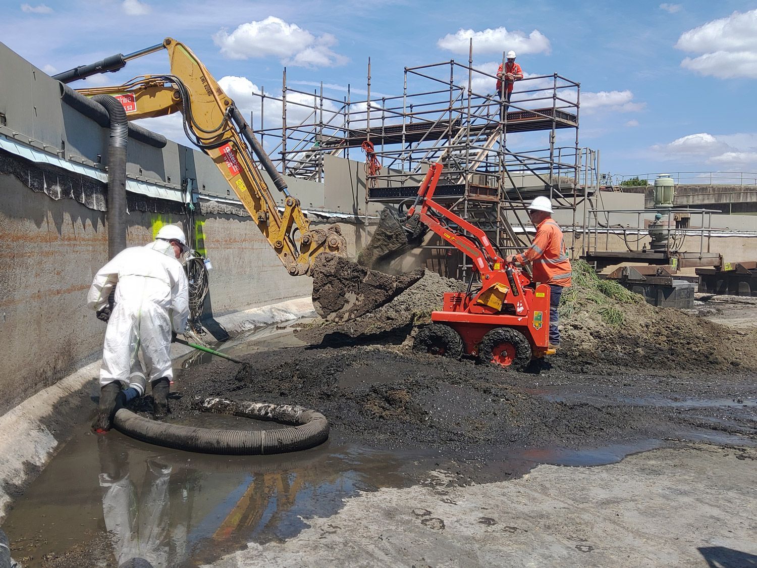The Aqua Assets team vacuum loading at an industrial facility.