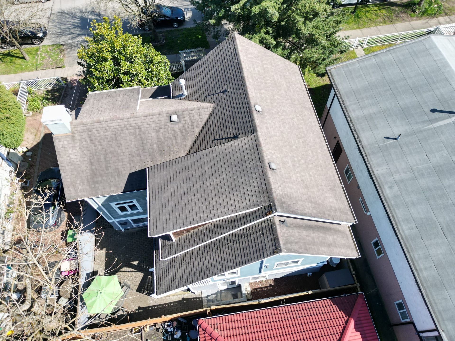 Drone aerial of Vancouver home roof at end of service life, age-based replacement at Prince Albert St, Paragon Roofing BC