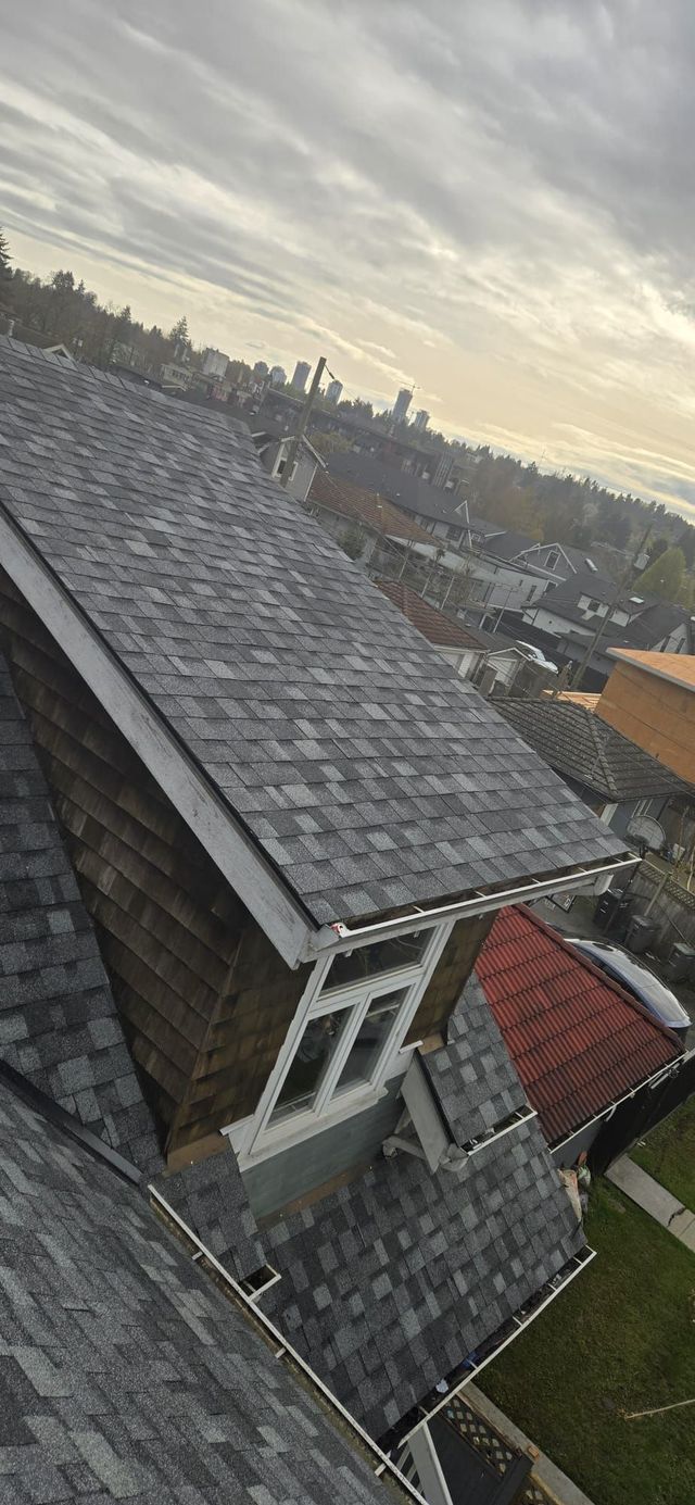 Finished shingle roof and dormer on Prince Albert Street in Vancouver